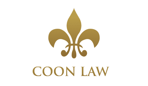 A green and gold logo for coon law llc.